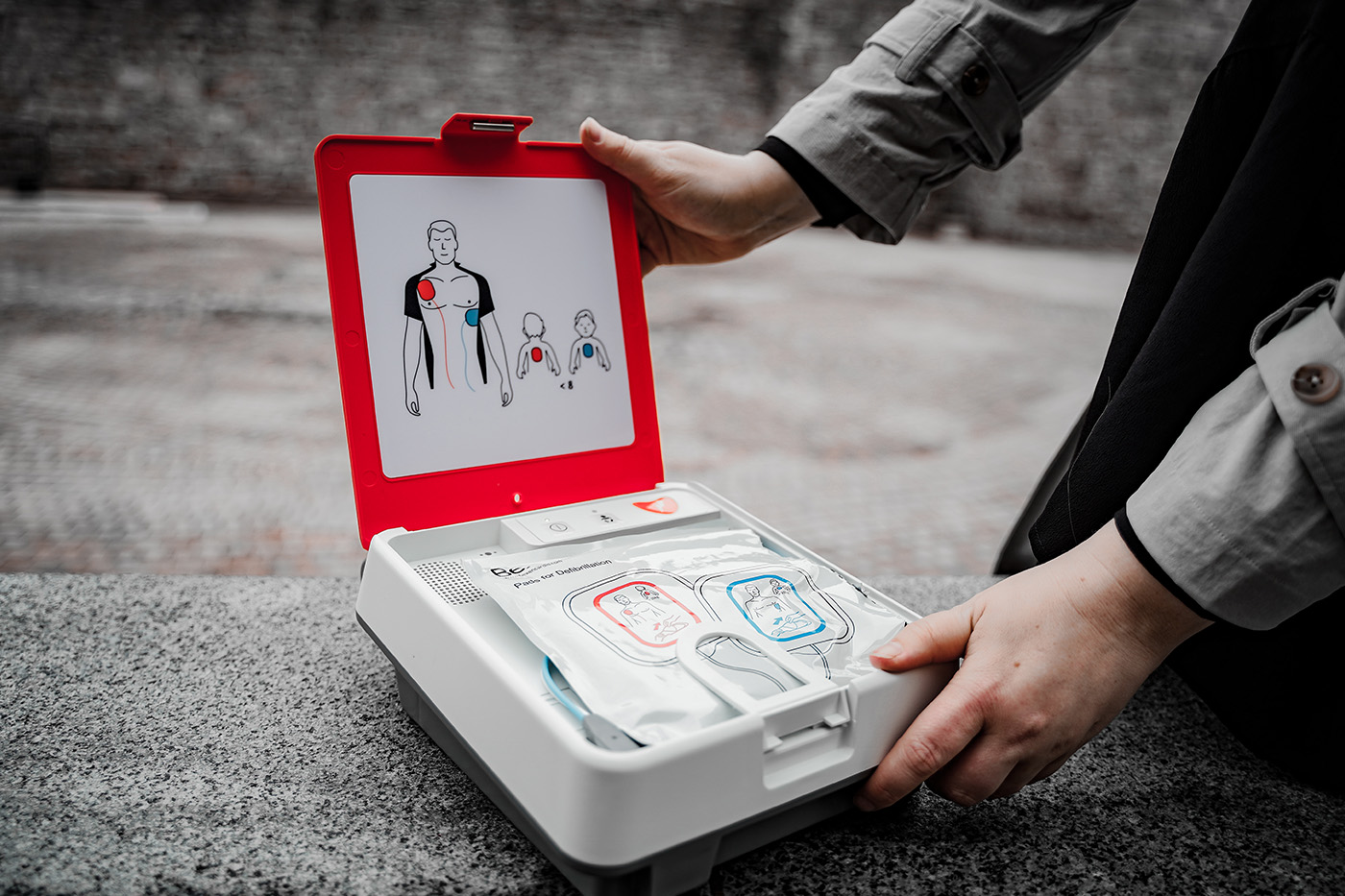 defibrillator is prepared for use by a person