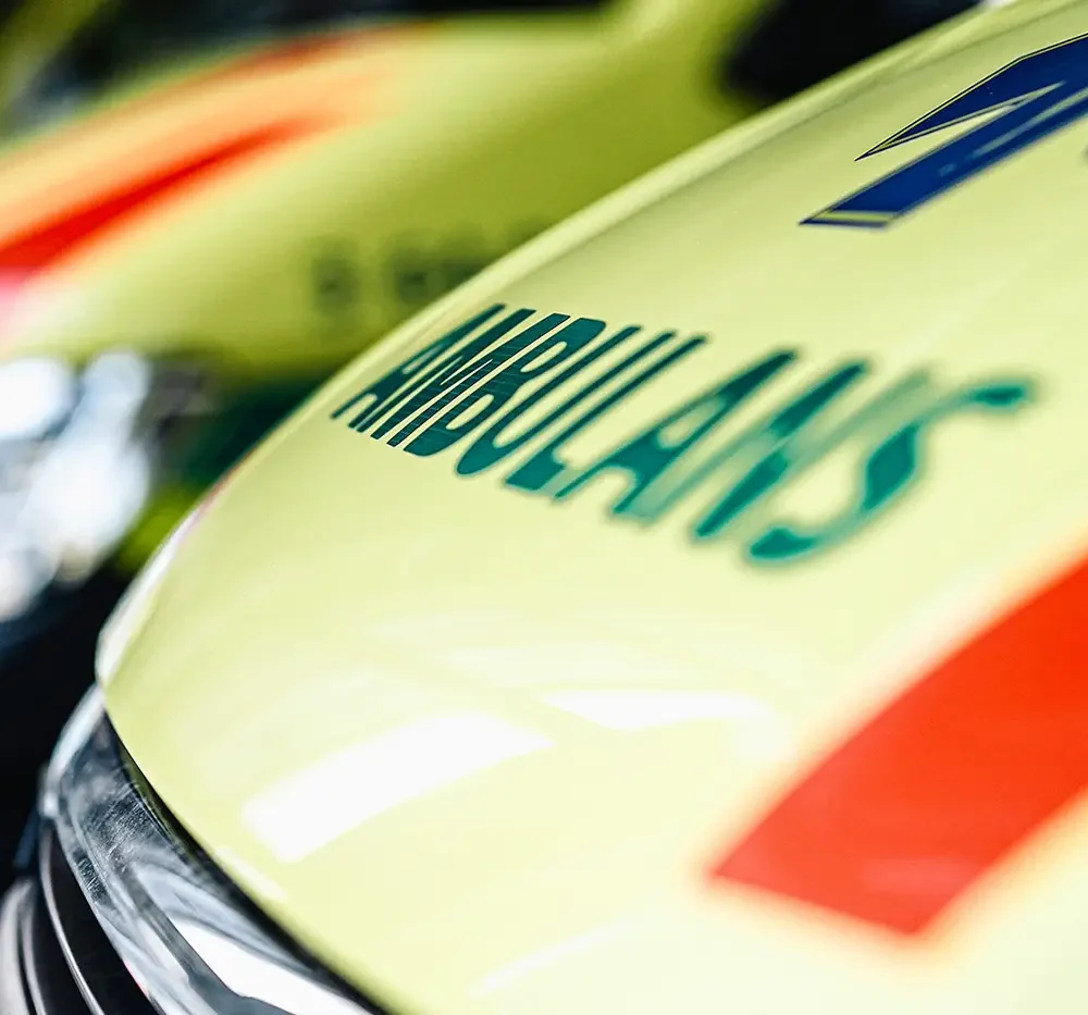 photo-of-the-front-ambulance-parked-at-station